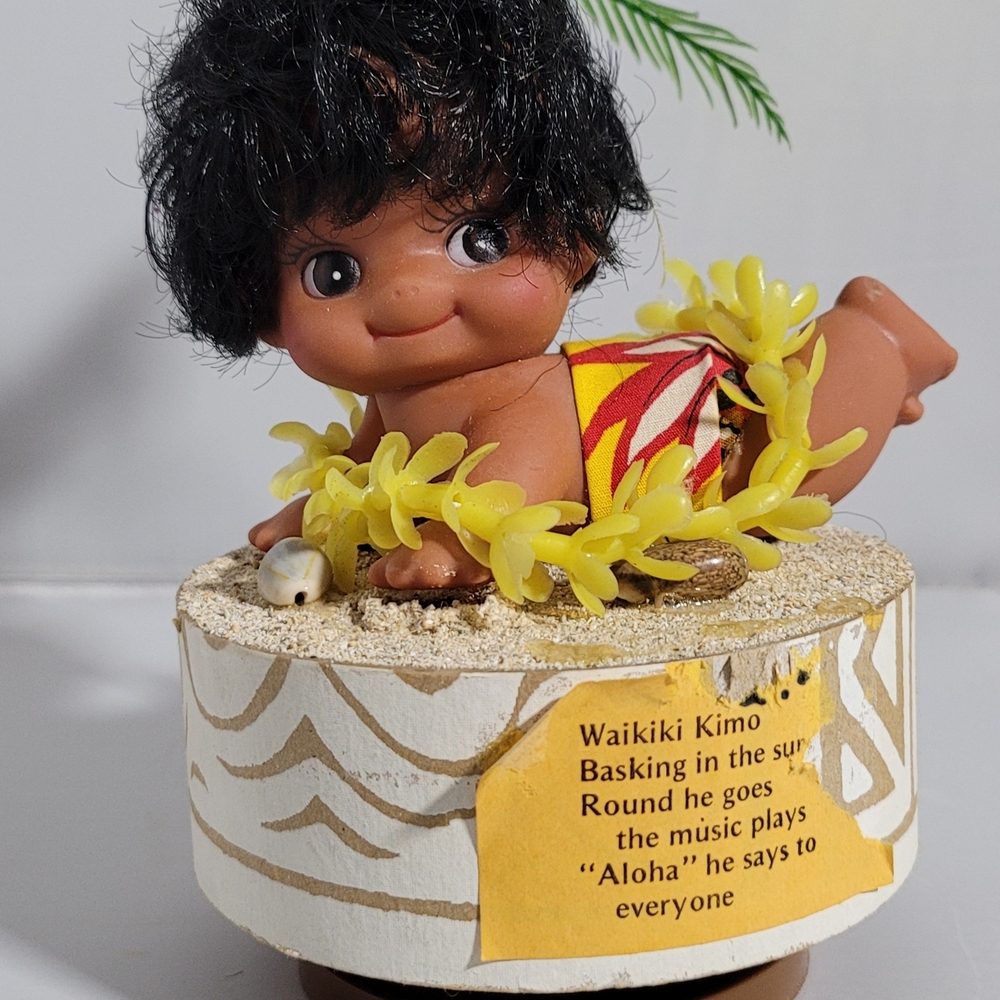 Vintage 1970s Waikiki Kimo Revolving Music Box Hawaiian Lei Beach Baby Figurine